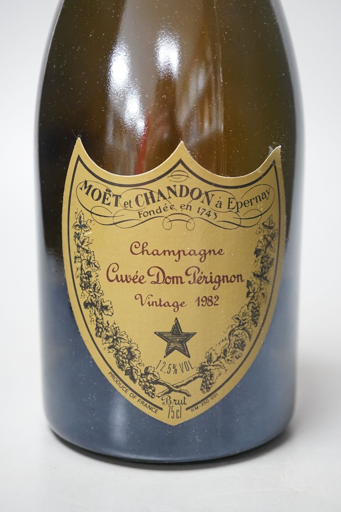 One boxed bottle of Dom Perignon vintage 1982 Champagne.